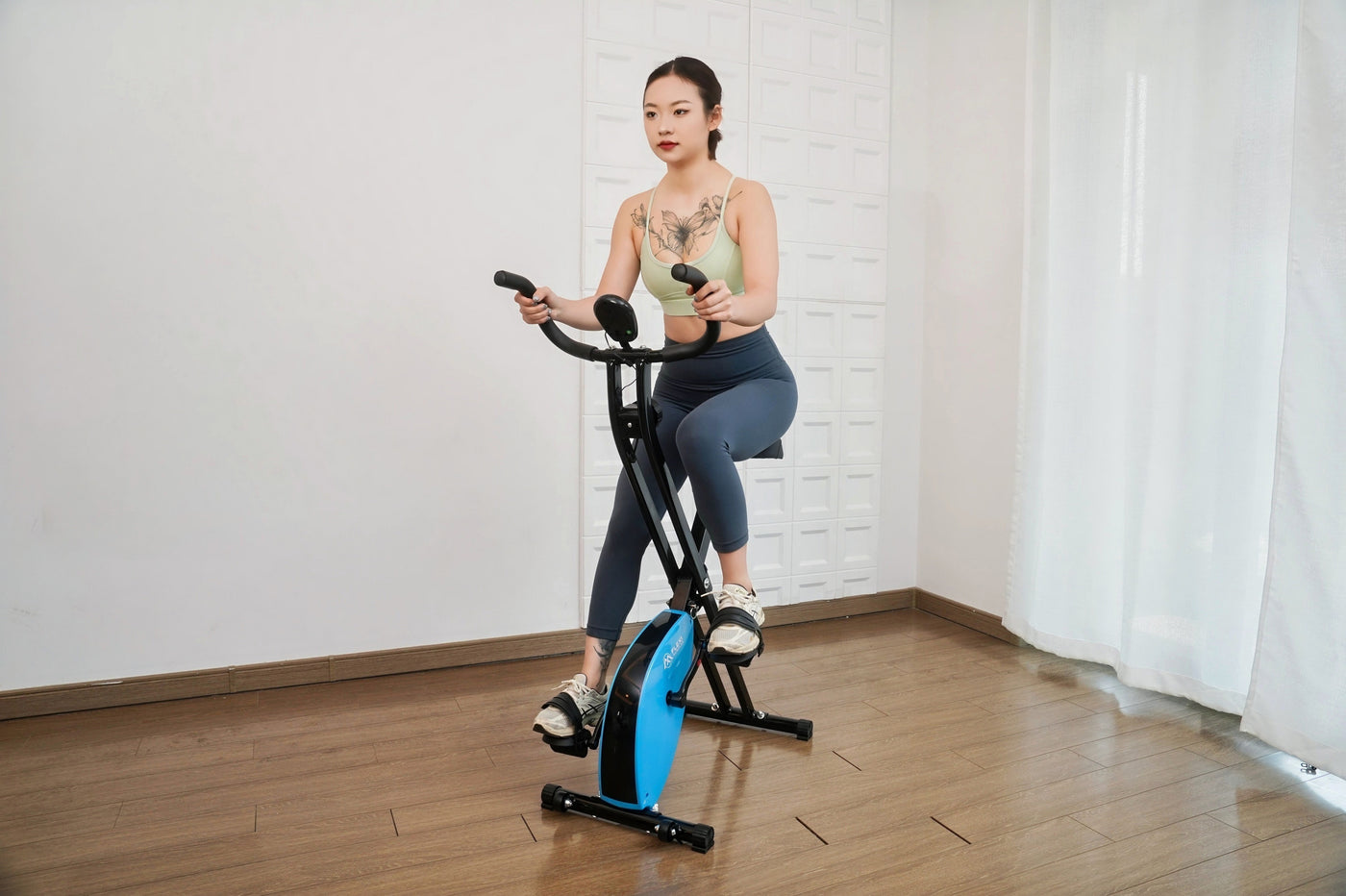 Foldable exercise bike with multiple resistance levels.