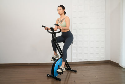Foldable exercise bike with multiple resistance levels.