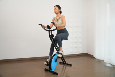 Foldable exercise bike with multiple resistance levels.