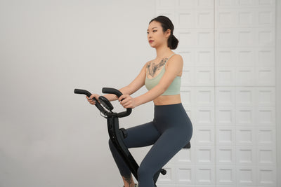 Foldable exercise bike with multiple resistance levels.