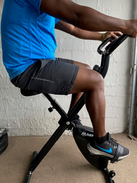 Flexi Muscles – Foldable exercise bike with multiple resistance levels.